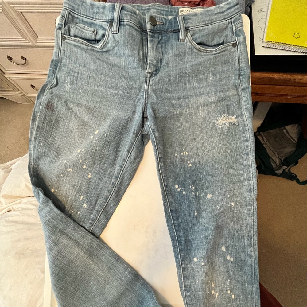 Distressed Blue Jeans with artistic white paint splater